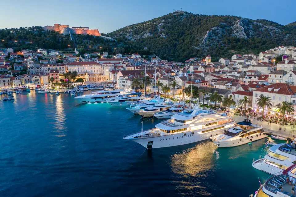 Yachts in Hvar harbour at dusk, Croatia